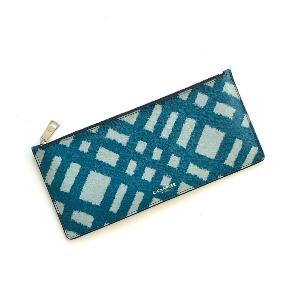 Like New Coach Leather Printed Zipper Pouch. Never Used. Perfect inside & out!